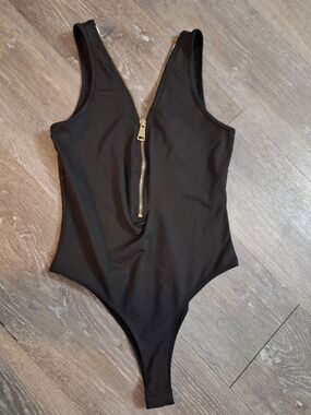 AKIRA Black Bodysuit with Gold Front Zip